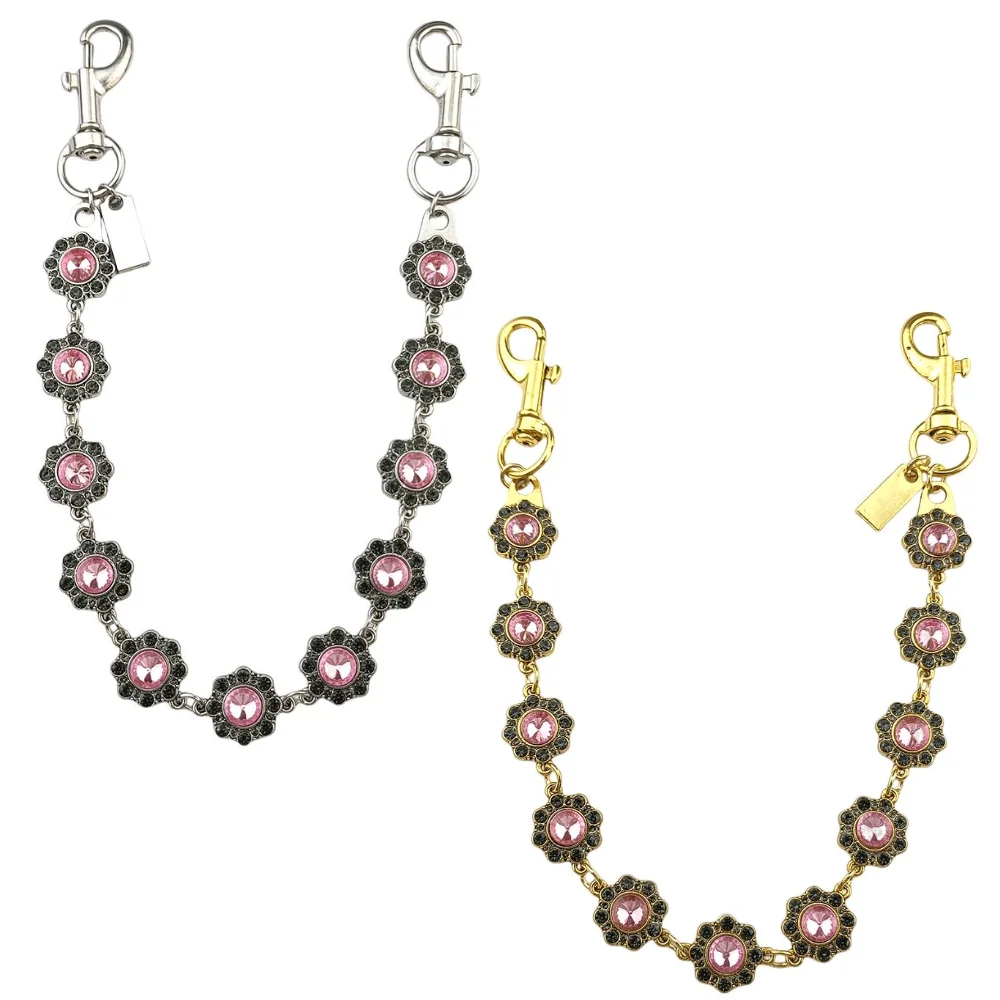 A delicate gold-toned chain necklace featuring pink and black floral charms.