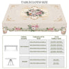 A beige tablecloth with a vintage French floral pattern featuring roses and daisies, shown alongside table shapes.
