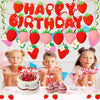 A strawberry birthday party decoration set featuring a banner, cake toppers, and cupcakes on a table.