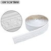 Roll of white 3D self-adhesive wall trim border for home decor featuring an ornate pattern