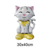 A realistic gray cat foil balloon decoration with yellow accents and a yellow paw print base.