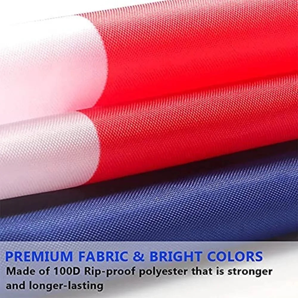 Close-up of three fabric flags in white, red, and blue showing texture and color contrast