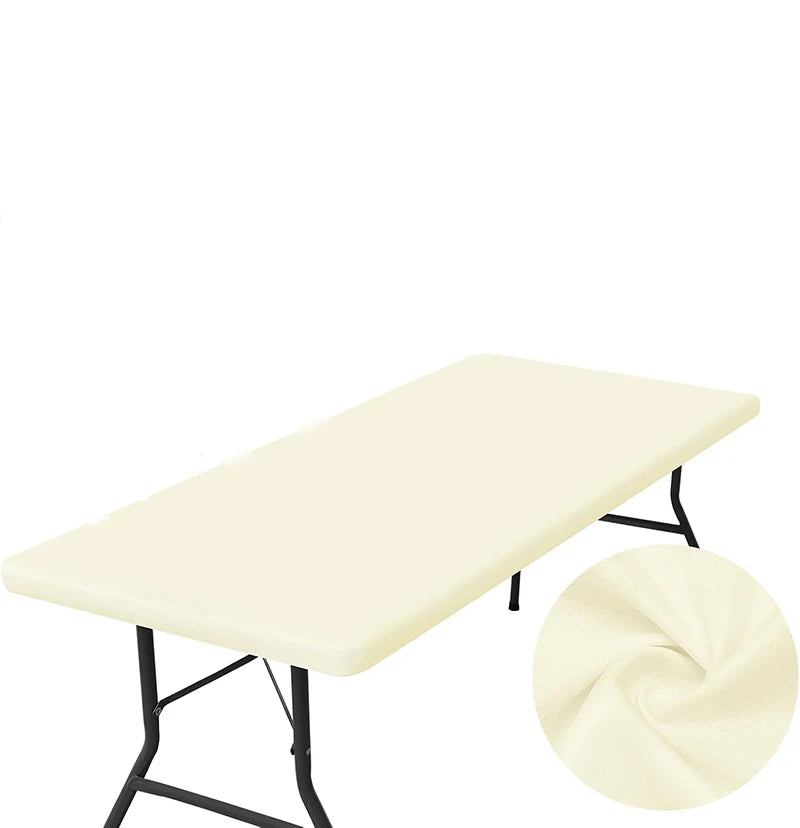 A rectangular white stretch tablecloth table with black legs.