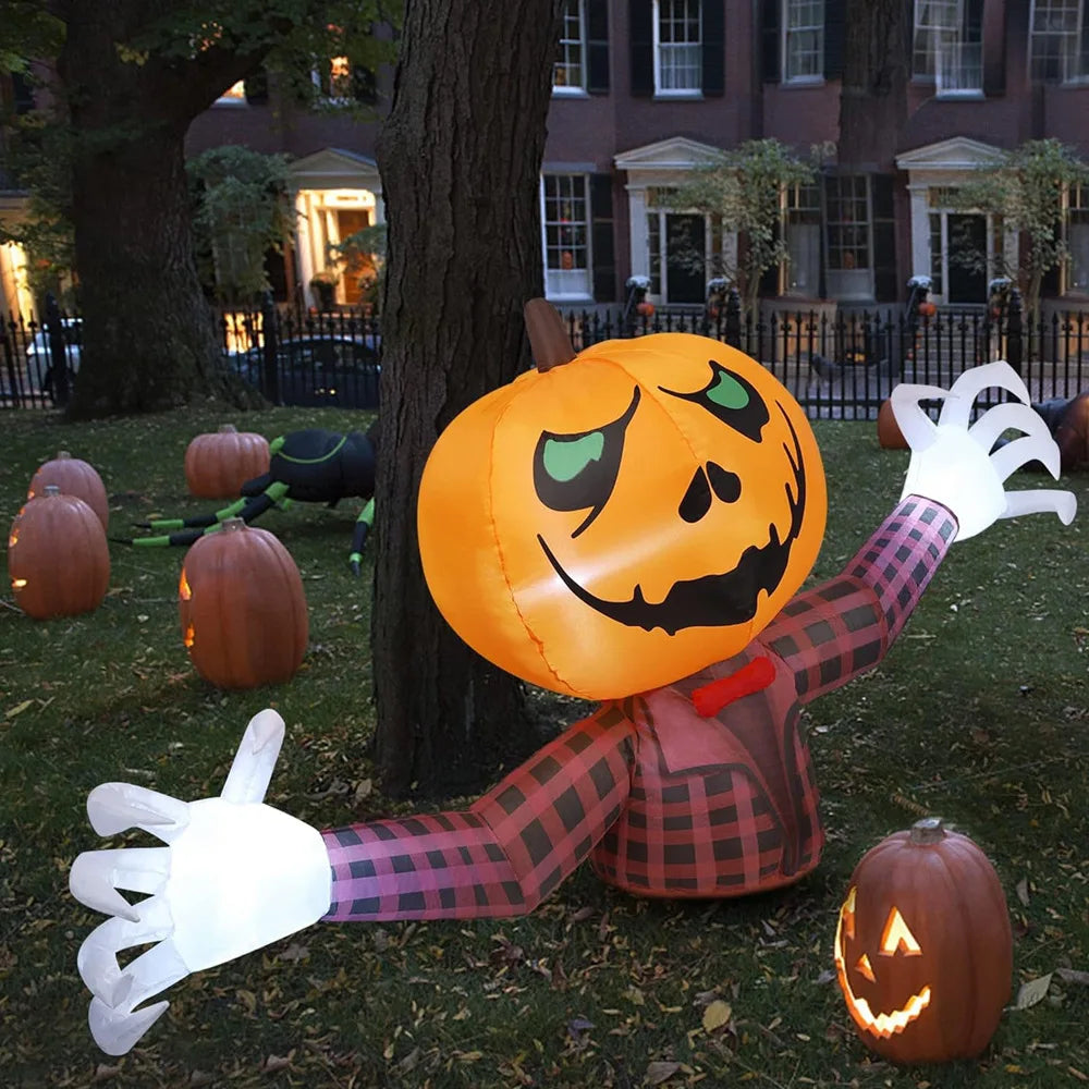An inflatable Halloween pumpkin decoration shaped like a person with a plaid shirt and white gloves lying on grass.