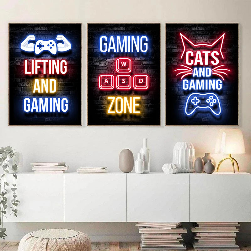 Three framed canvas art prints featuring neon alphabet text on a dark background related to gaming and cats