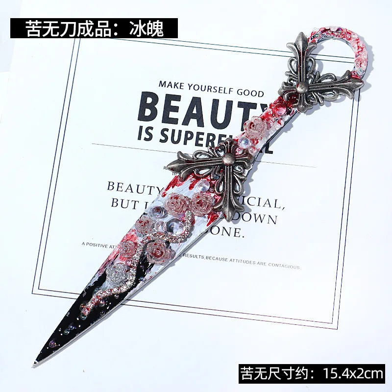 A decorative gothic kunai utility knife with a silver handle and blood-red floral accents.