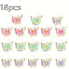A set of 18 colorful butterfly decorations for a garden party table