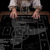 A dark altar cloth featuring a Celtic Cross design with numbered sections for tarot and divination.