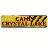 Vintage metal wall sign with the text CAMP CRYSTAL LAKE in distressed red lettering on a yellow background.