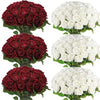 A collection of artificial roses in deep red and white colors displayed in bouquets.