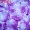 Purple and white silk rose petals used for weddings and events