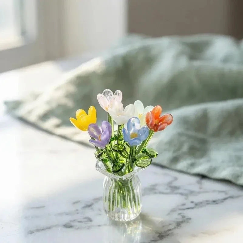 Handcrafted mini glass flower sculpture featuring colorful blooms in a clear glass vase
