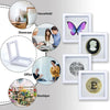 A collection of floating shadow box jewelry display frames featuring various items like a butterfly, a pearl, and a Bitcoin c