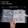 A hand holds an open transparent jewelry organizer storage bag showing multiple compartments for storing jewelry.