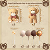 A set of five gold and brown spherical cake toppers and one star topper displayed on a beige background.