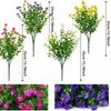 A collection of faux floral plants in purple and yellow colors displayed against a white background.