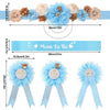A set of floral maternity sash and corsage pins featuring light blue flowers and accents for a baby shower.