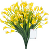 A bouquet of yellow and white artificial calla lilies for home decor