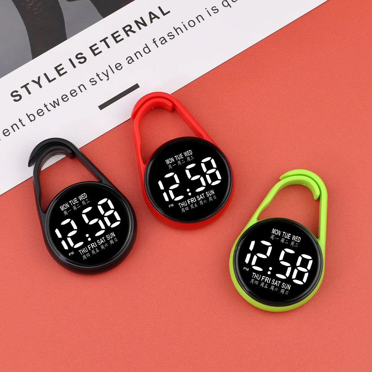 A set of three LED pocket watches with touch control and night light features displayed on a red background.