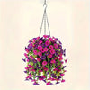 A vibrant purple and pink silk peony hanging garland suspended by a metal chain.
