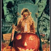 Canvas wall art featuring a horror movie scene with Michael Myers and a carved pumpkin.