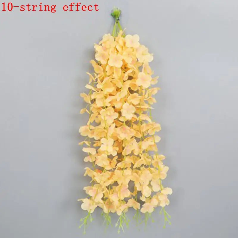 A long, drooping garland of yellow artificial flowers resembling a 10-string effect.