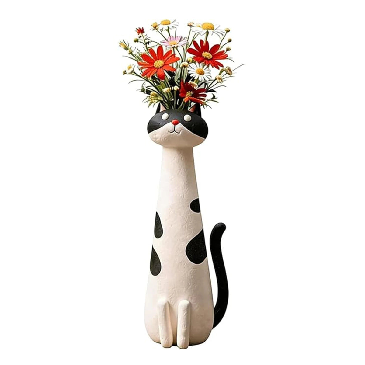 A whimsical resin cat figurine with a black and white coat holding a bouquet of red and yellow flowers.