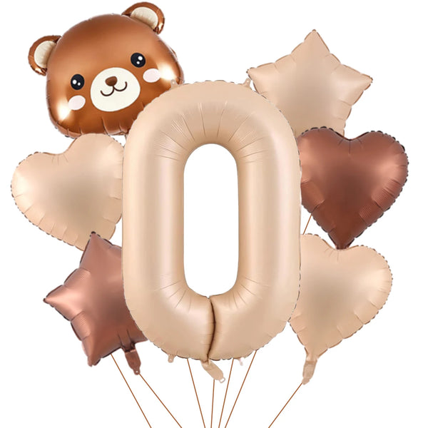 A set of foil balloons shaped like a bear and the number zero in a metallic caramel color