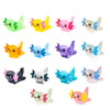 A collection of colorful mini resin axolotl figurines in various shades including green, yellow, pink, blue, and purple.