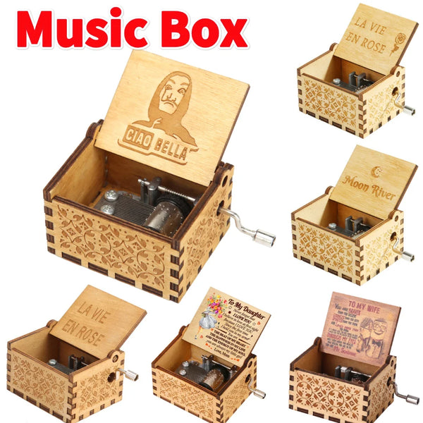 A set of retro hand-cranked wooden music boxes with decorative floral patterns.