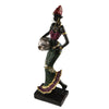 Hand-painted resin statue of an African tribal lady with a red headdress and gold jewelry.