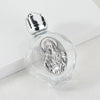 Decorative glass bottle with a silver figurine and twist cap