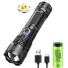 A black rechargeable zoom flashlight with a silver head and green battery, shown from the side.