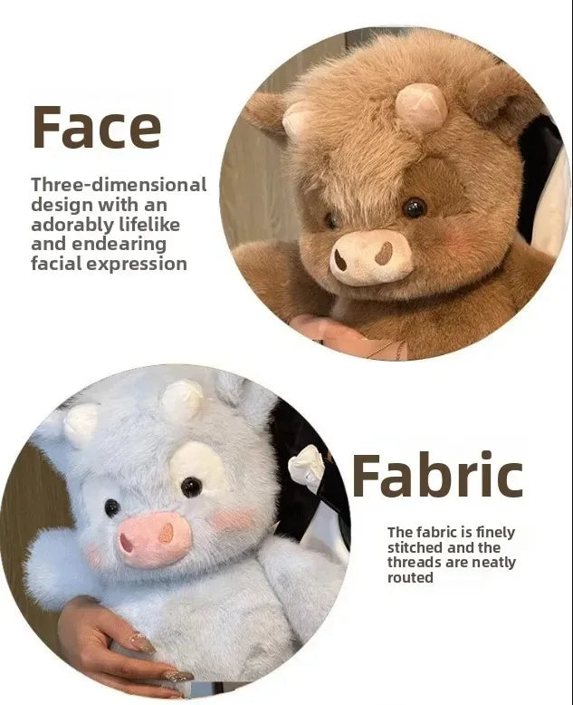 Close-up view of a fluffy brown Highland cow plush toy face and a white Highland cow plush toy face.