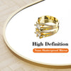 Gold diamond ring with three stacked bands shown on a white background