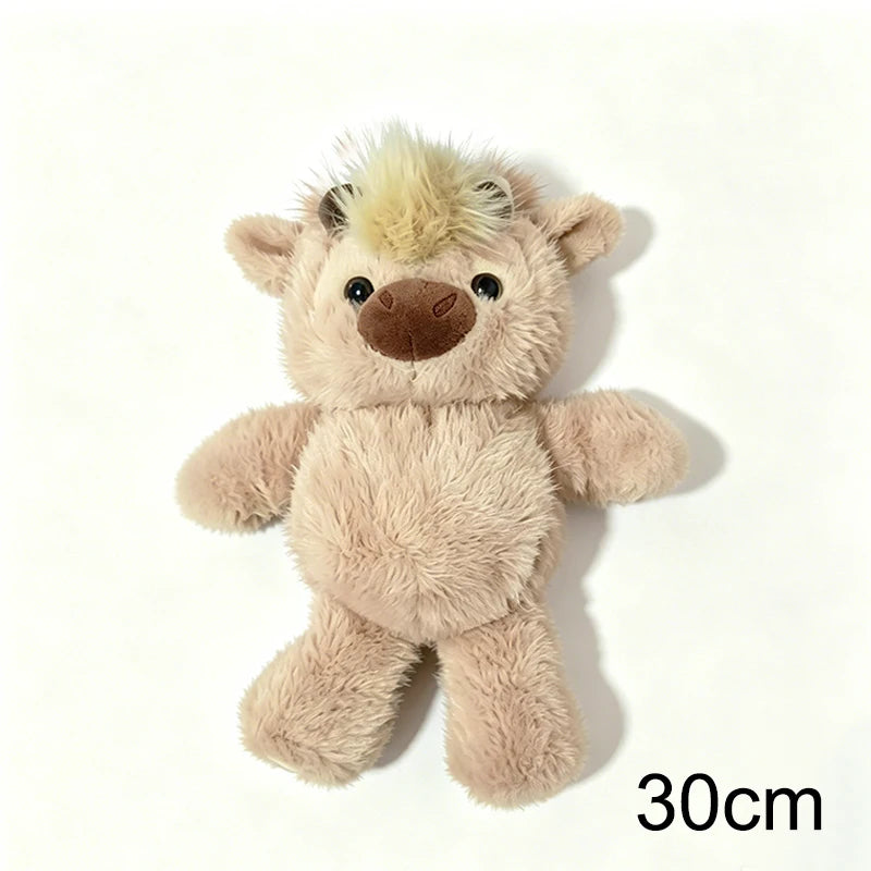 A soft, light brown West Highland Calf plush toy with a fluffy mane and nose.