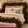 Artificial red berry holly Christmas garland decorating a bed frame and bedding