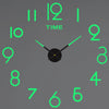 A minimalist green analog clock face showing the time, with hour markers and hands.
