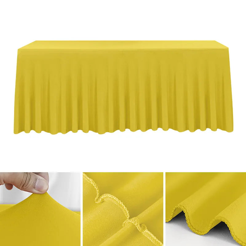 A bright yellow stretch rectangle tablecloth draped over a table, showing close-ups of the fabric texture.
