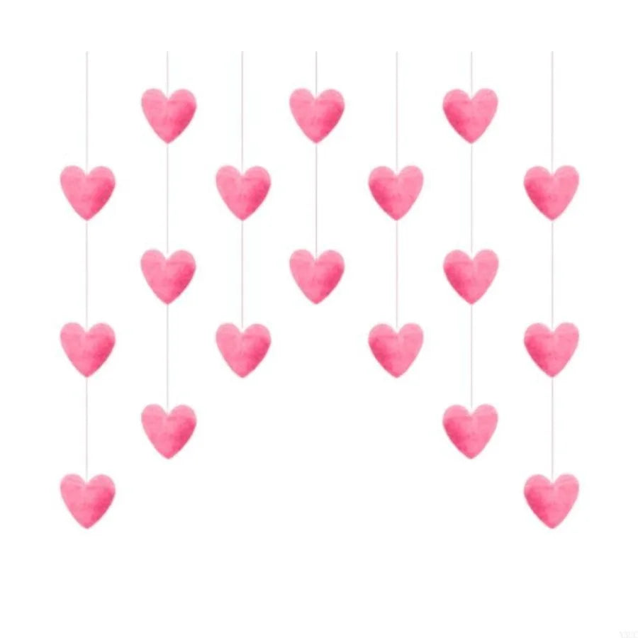Pink tassel door curtain decorated with heart and star shapes hanging vertically