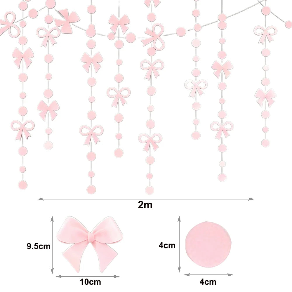 Pink bow cupcake topper set featuring delicate pink bows on clear strings for birthday and bridal shower decorations