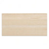 A light natural wood plank used as a custom wooden sign for home decor.