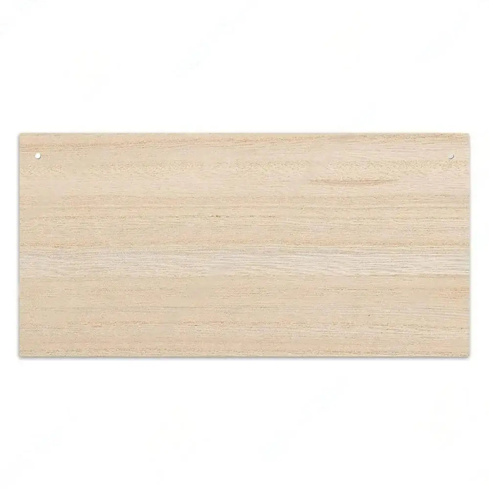 A light natural wood plank used as a custom wooden sign for home decor.