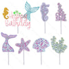 A set of mermaid tail and sea star cake toppers in pink, purple, and teal glitter.