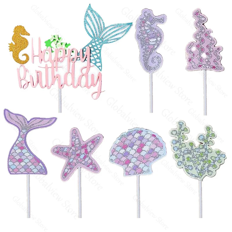 A set of mermaid tail and sea star cake toppers in pink, purple, and teal glitter.
