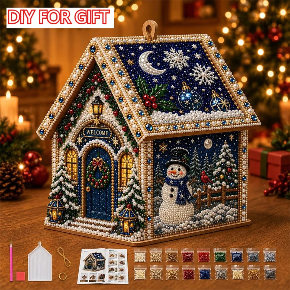 A DIY diamond painting kit of a Christmas cabin house featuring a snowy scene and festive decorations.