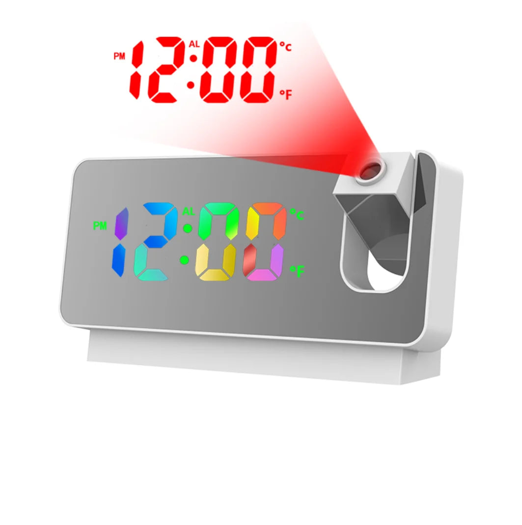A digital alarm clock displaying 12:00 AM and temperature, with a red light beam shining onto the display.