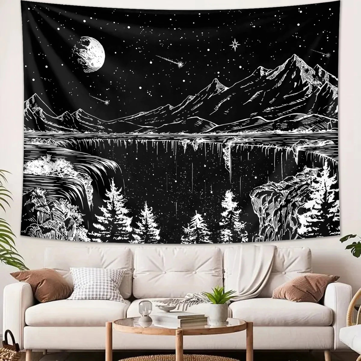A black tapestry depicting a mountainous landscape under a starry night sky with a large moon and silhouetted trees.