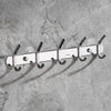 A set of six polished 304 stainless steel wall-mounted hooks mounted on a gray concrete surface.