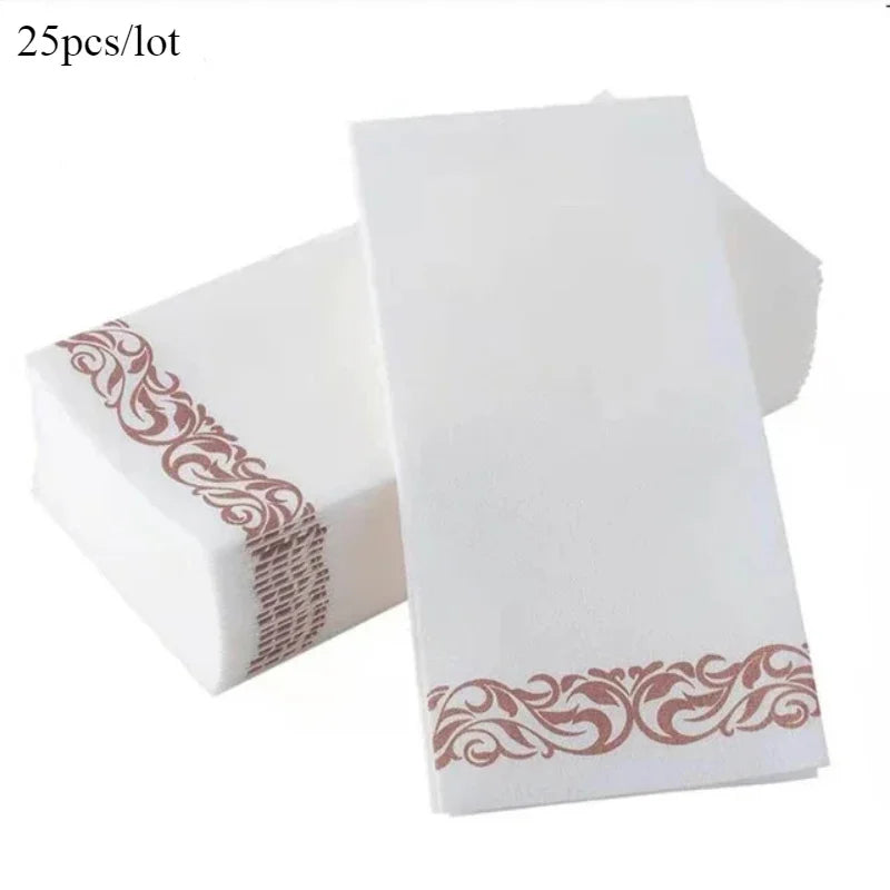 A stack of white paper dinner napkins with rose gold trim, showing a close-up view.